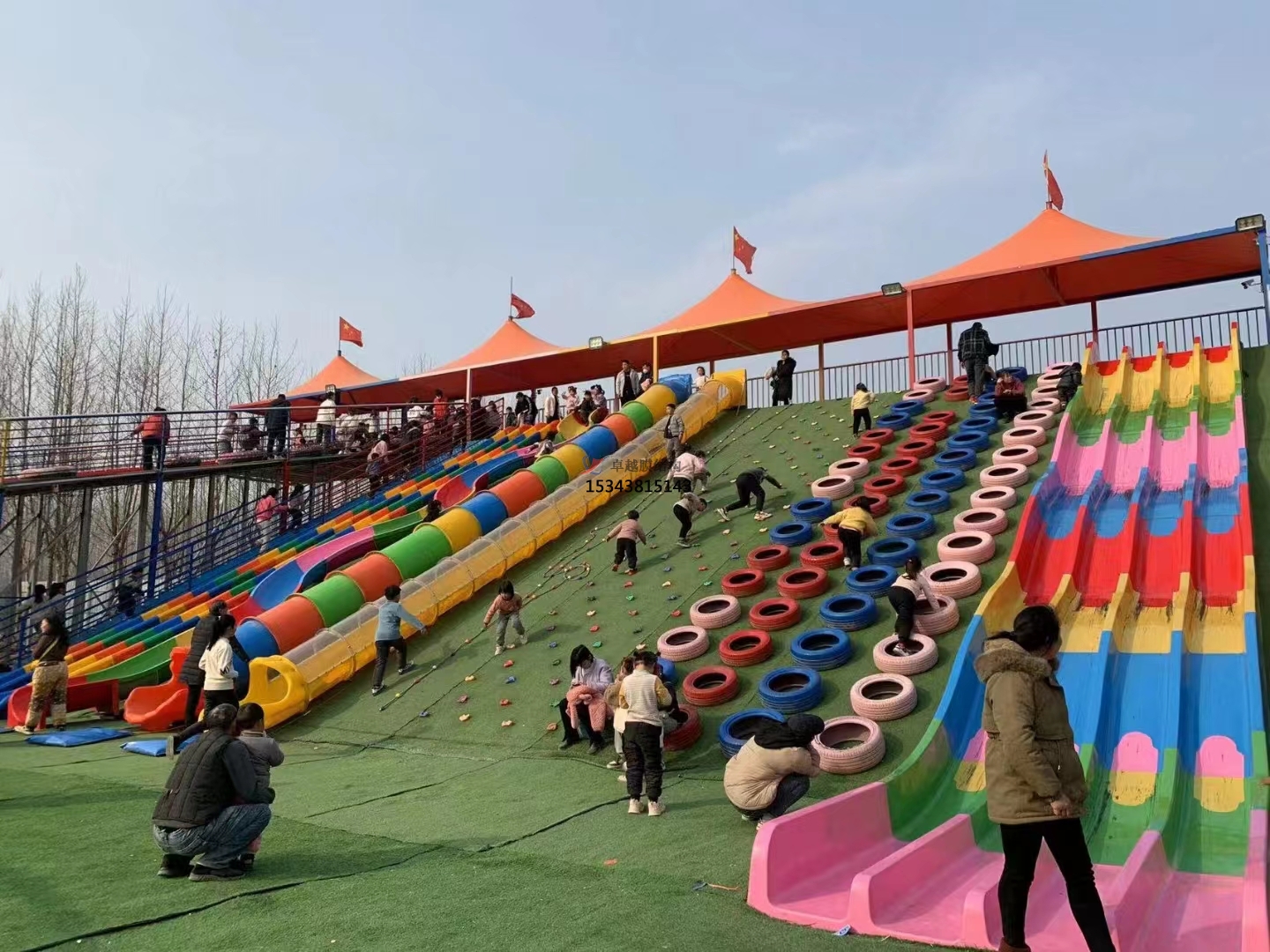 焦作彩虹滑道游樂設備紅色遮陽棚結構設計生產(chǎn)